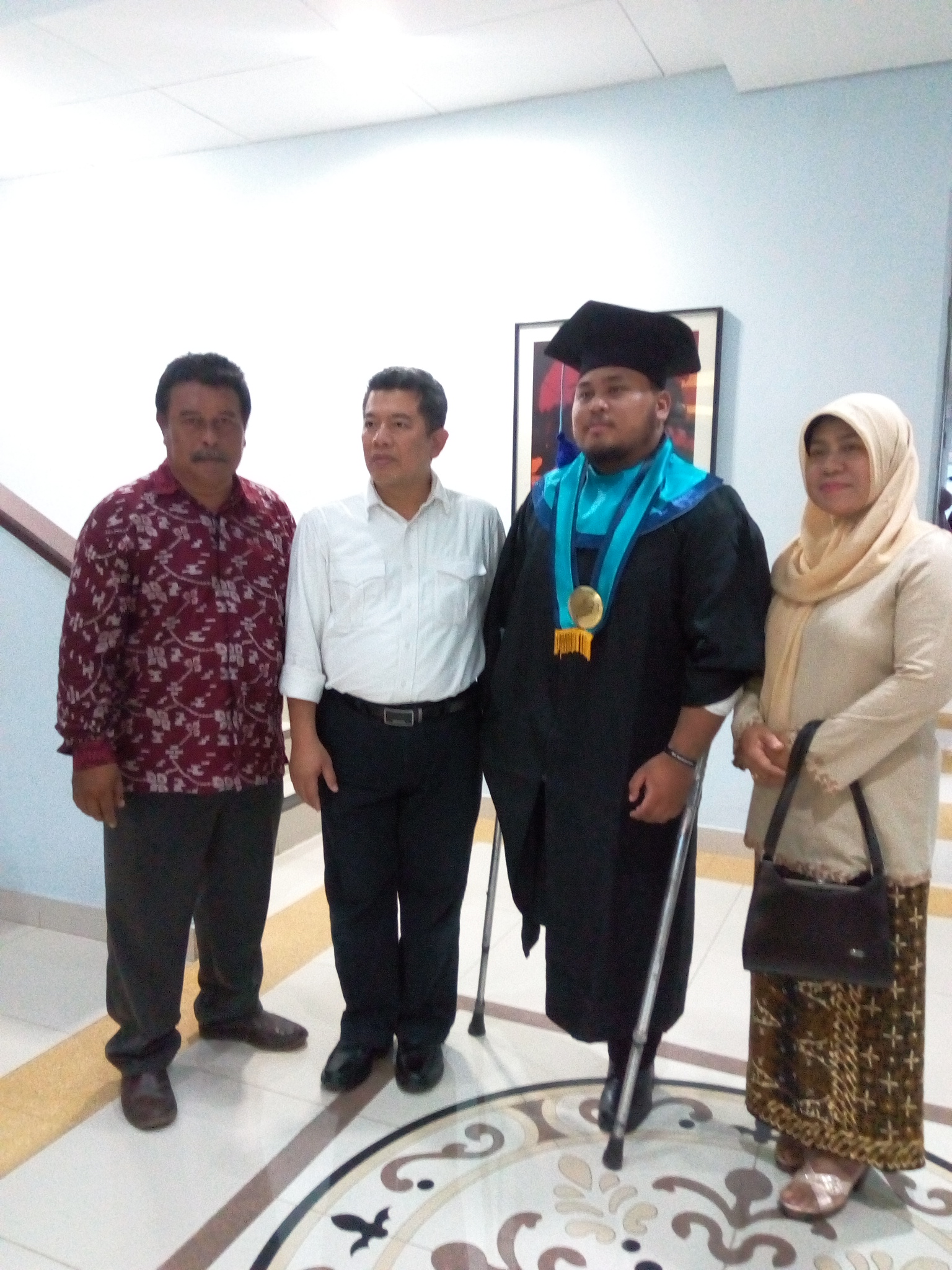 Wisuda STMM 2019 :  Faris Fadhli Sosok Wisudawan Difabel Yang Inspiratif